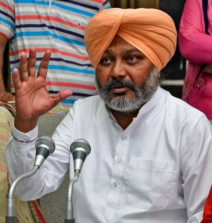 CONGRESS Congress government has issued warrants for farmers' outstanding loans